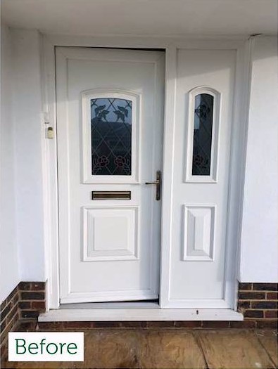 Before: original white uPVC door with decorative glass panels